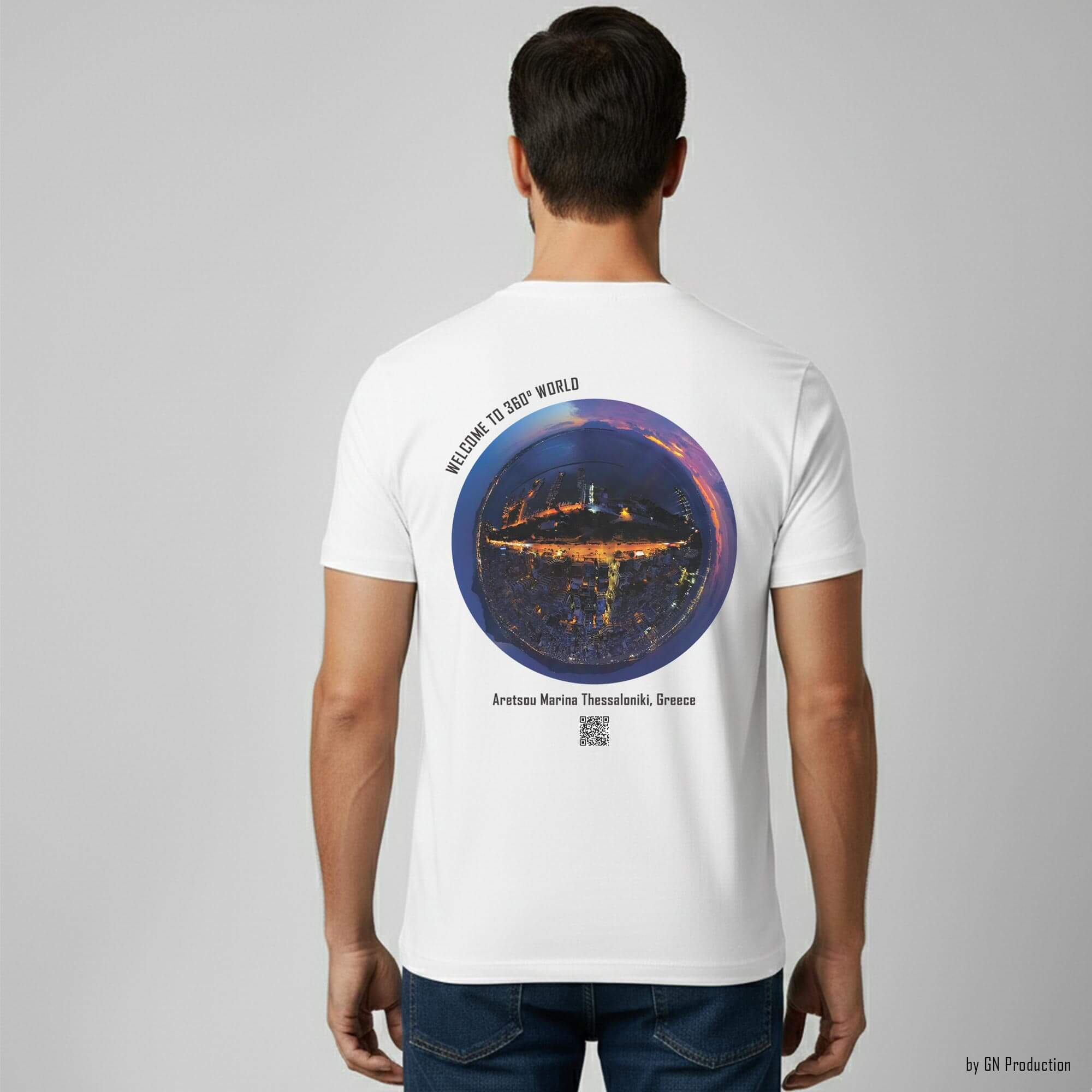 Man model wearing white art T-shirt with Aretsou Marina Thessaloniki night drone tiny-planet 360° artwork, back view, Greece