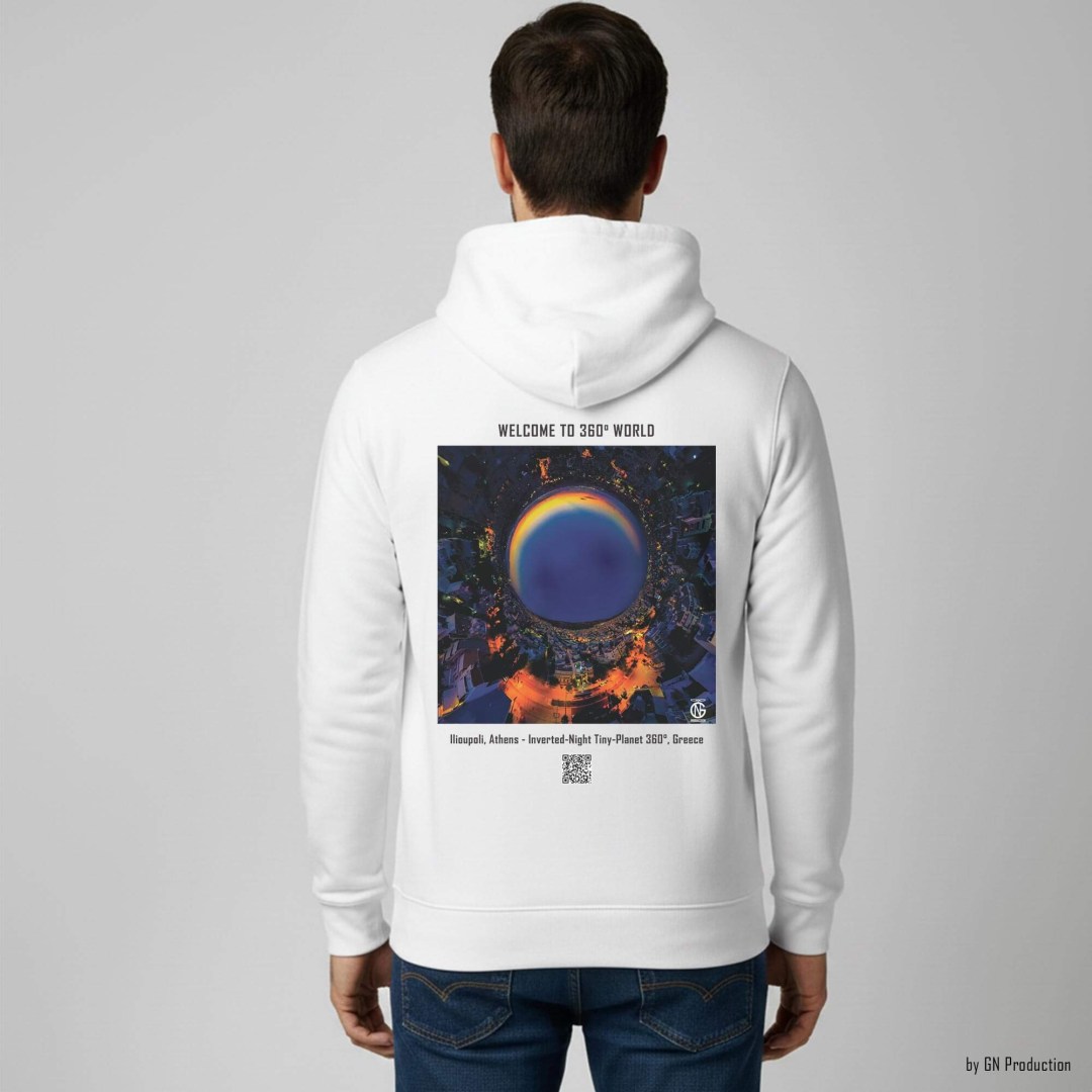 Man wearing a white hoodie with Ilioupoli, Athens inverted-night tiny-planet 360° print on the back, cinematic urban night tones with circular amber streetlights and QR code detail.