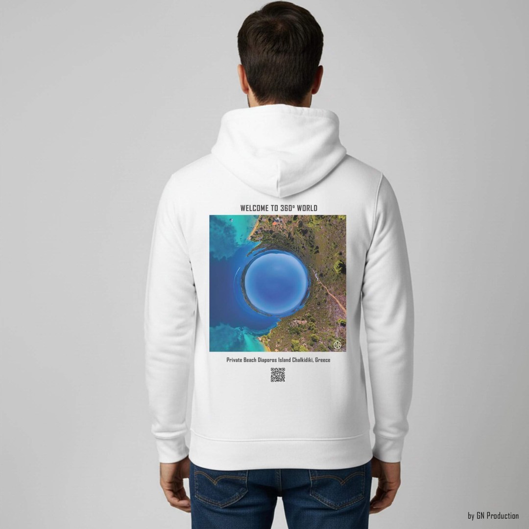 Man wearing a white GN Production hoodie with Private Beach, Diaporos Island inverted tiny-planet 360° coastal artwork on the back, circular turquoise sea composition.