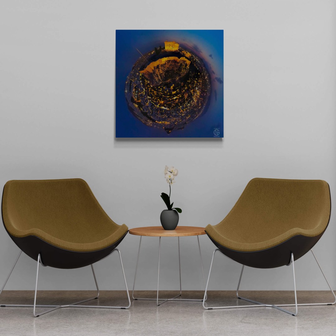 Night tiny-planet Parthenon canvas mounted between lounge chairs in an office seating nook.