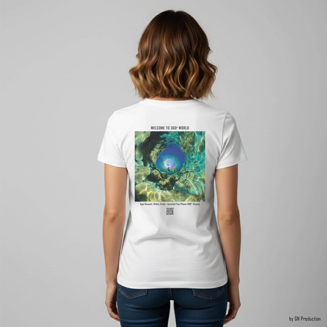 Woman model wearing white art T-shirt featuring Agia Roumeli, Sfakia inverted tiny-planet 360° artwork, back view, Crete Greece