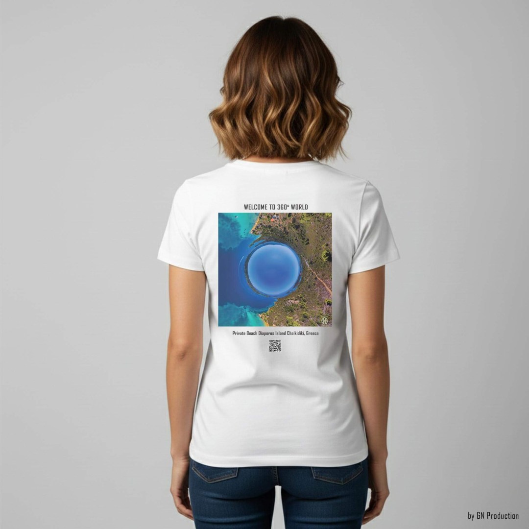 Woman model wearing white art T-shirt with inverted tiny-planet 360° artwork of Private Beach, Diaporos Island, serene turquoise cove.